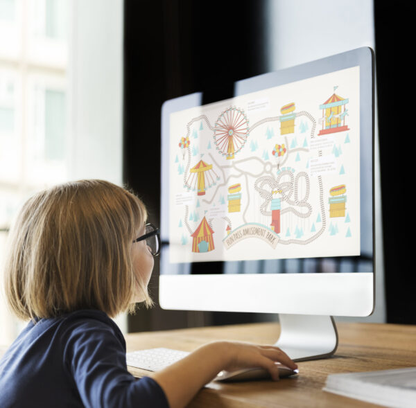 Little Girl Using Computer Concept