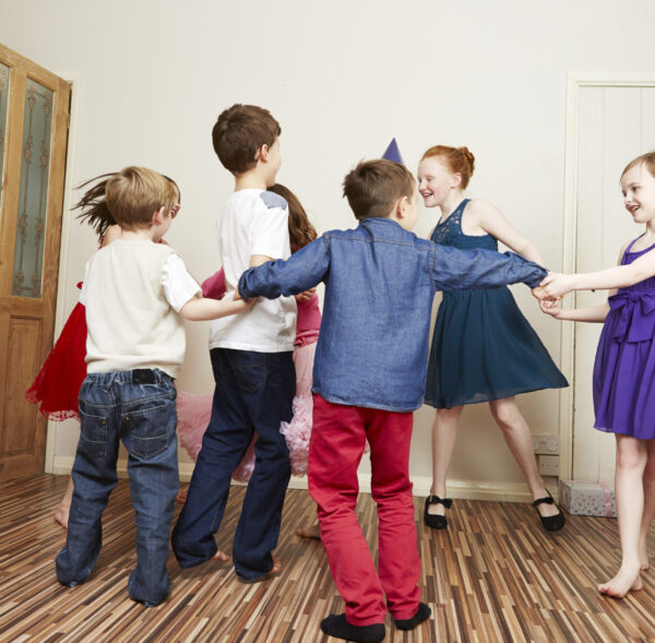 Children dancing at birthday party
